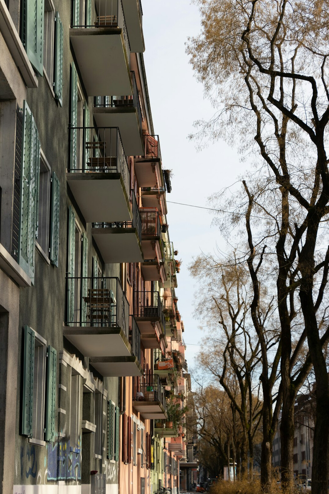 Row of Swiss residential apartment buildings with balconies