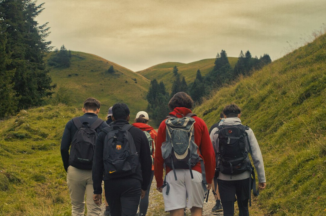 person hiking in swiss mountains